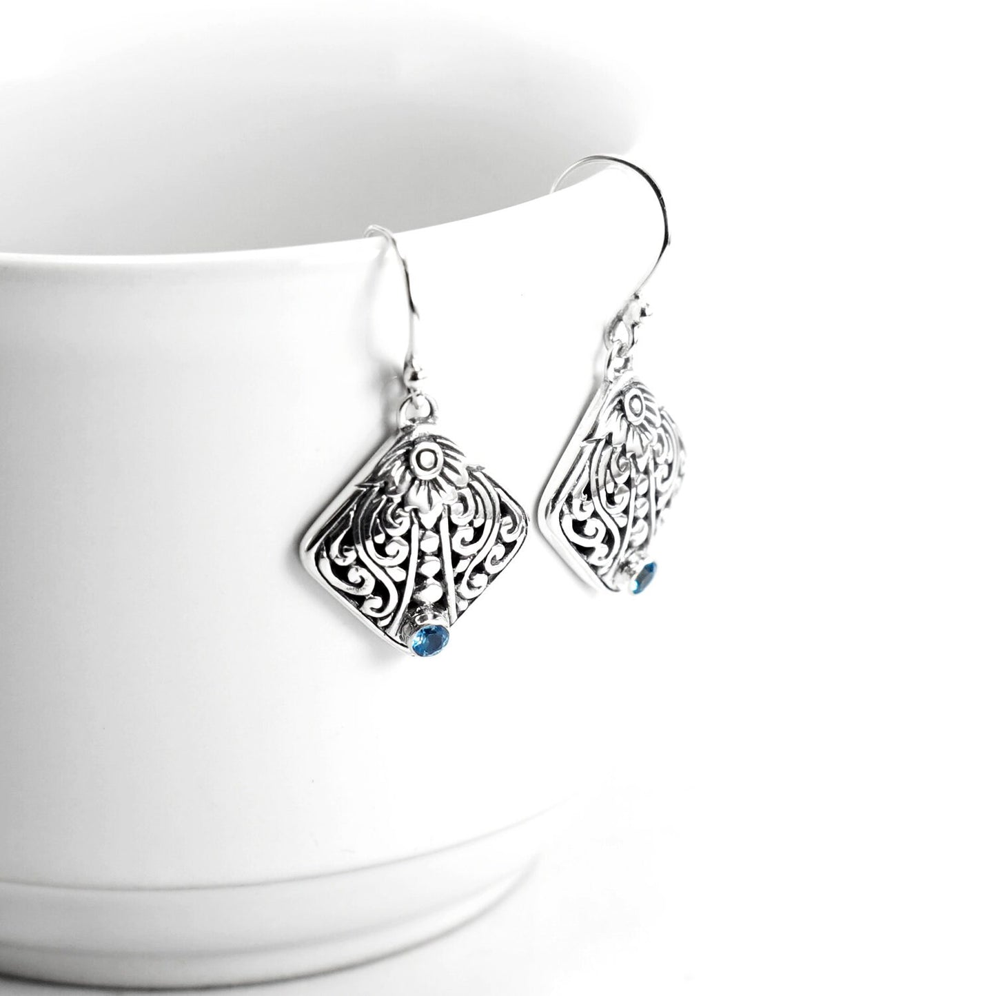 Leaf earrings 925 sterling silver decorated with filigree art and genuine blue topaz
