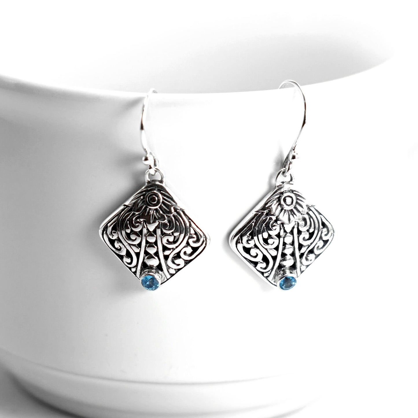 Leaf earrings 925 sterling silver decorated with filigree art and genuine blue topaz