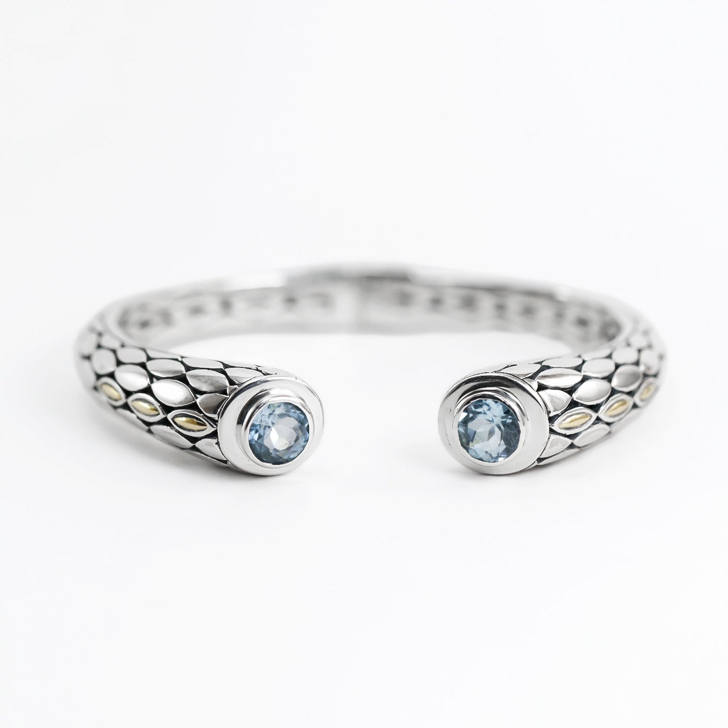 hinged bangle 925 sterling silver with genuine blue topaz decorated with 18K gold accent and snake skin pattern