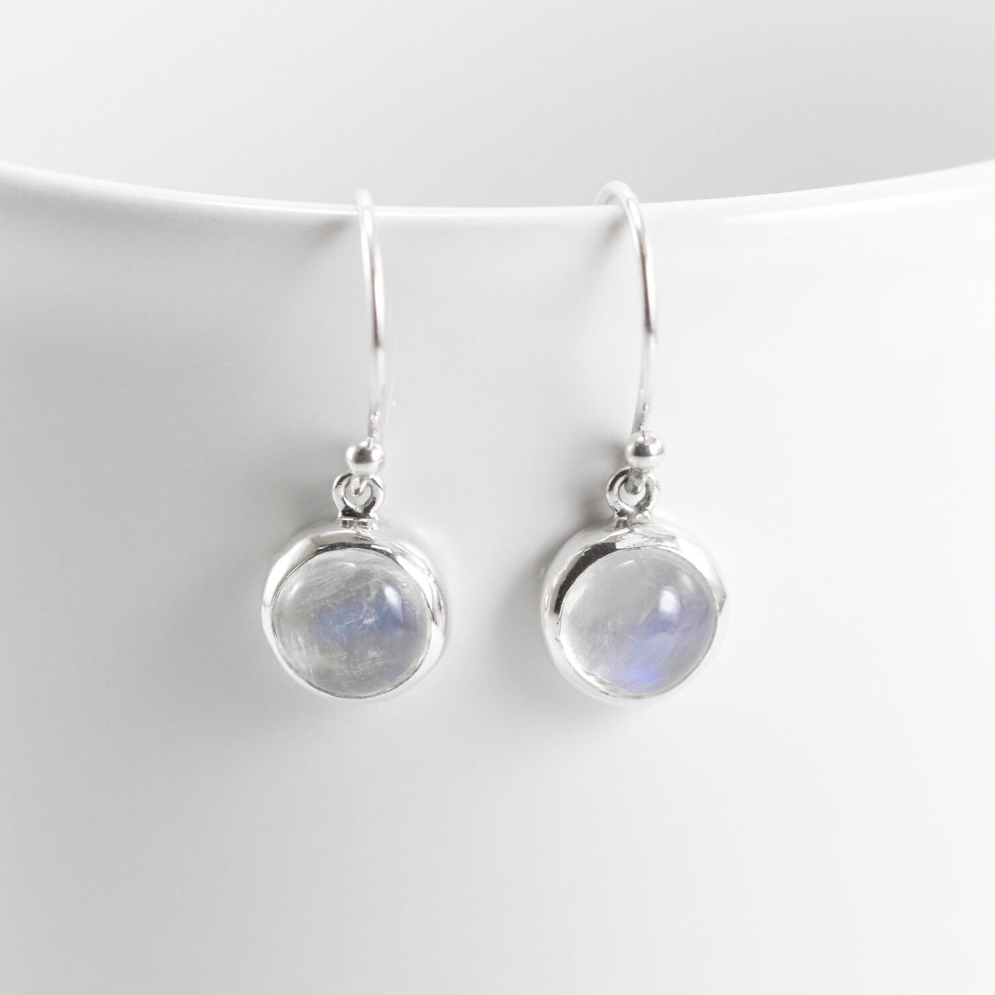 Round Moonstone earrings set in 925 sterling silver round dangle decorated with filigree edge