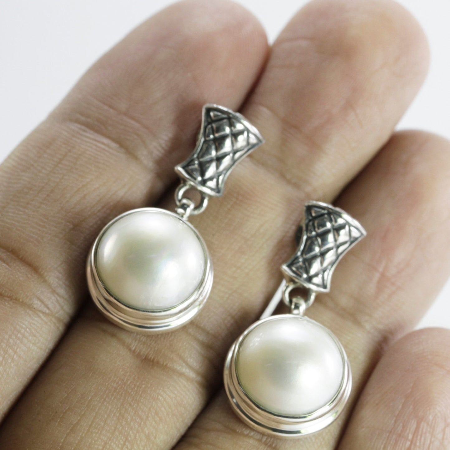 white mabe pearl earrings set in 925 Sterling silver dangle drop