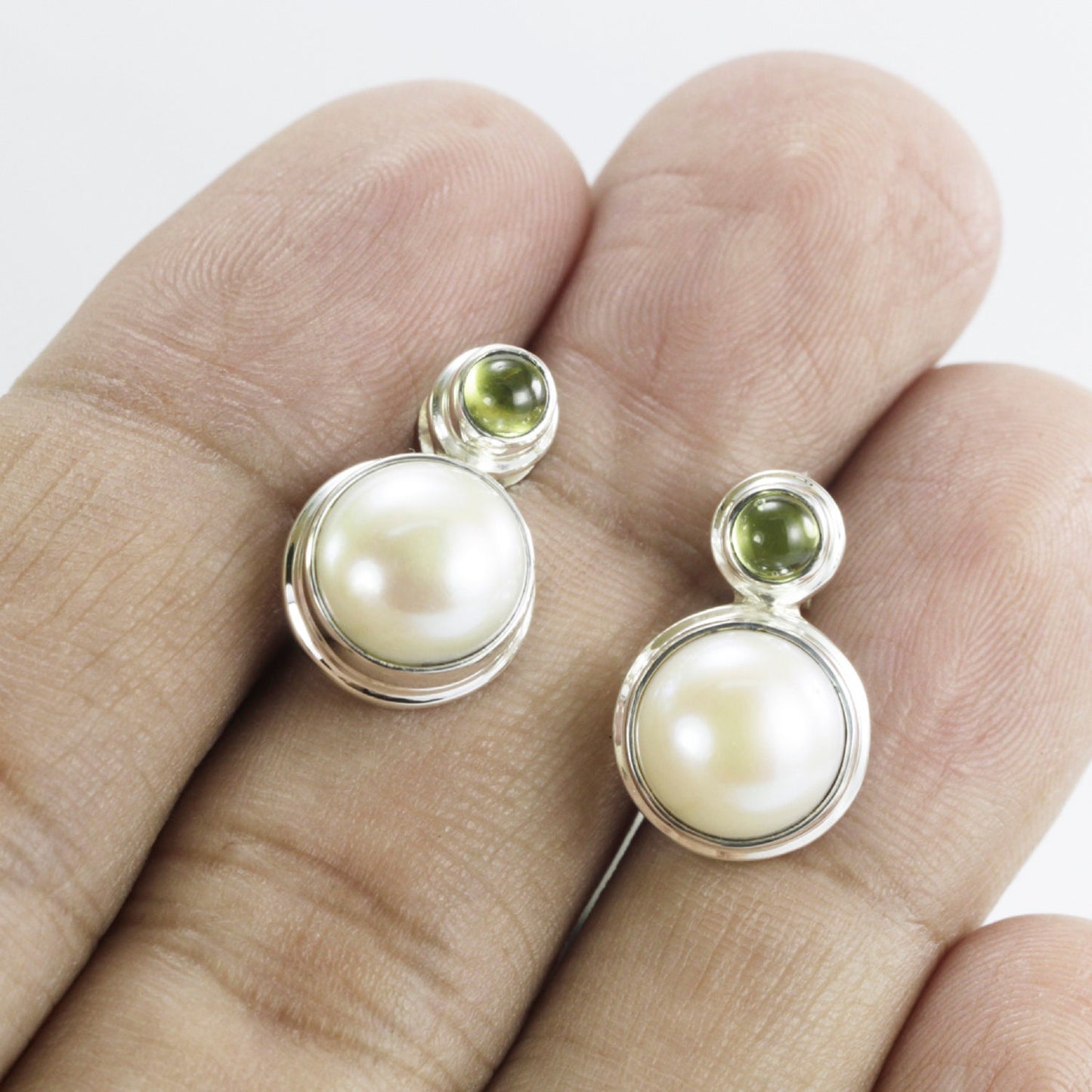 Cultured Pearl earrings studs in sterling silver bezel set with natural green Peridot push back closure