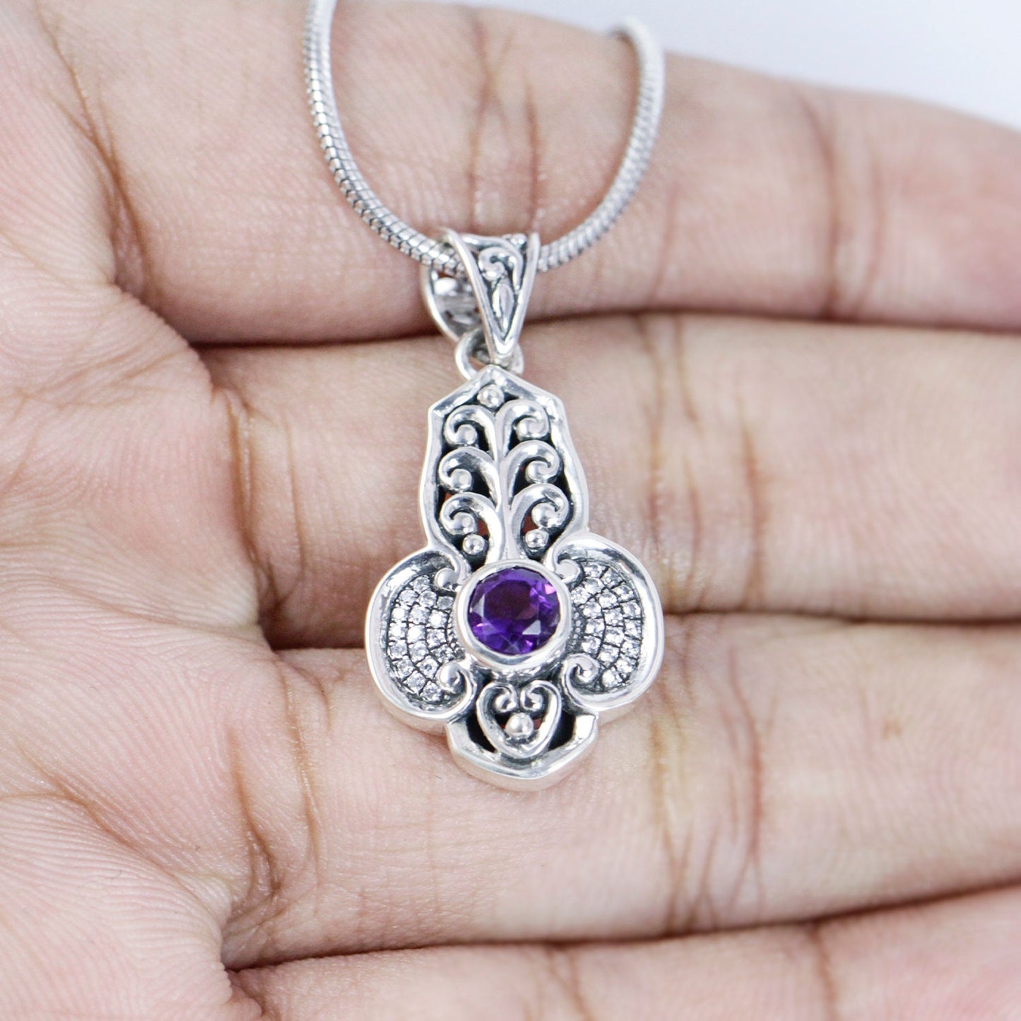 amethyst pendant 925 sterling silver decorated with filigree art and white topaz pave