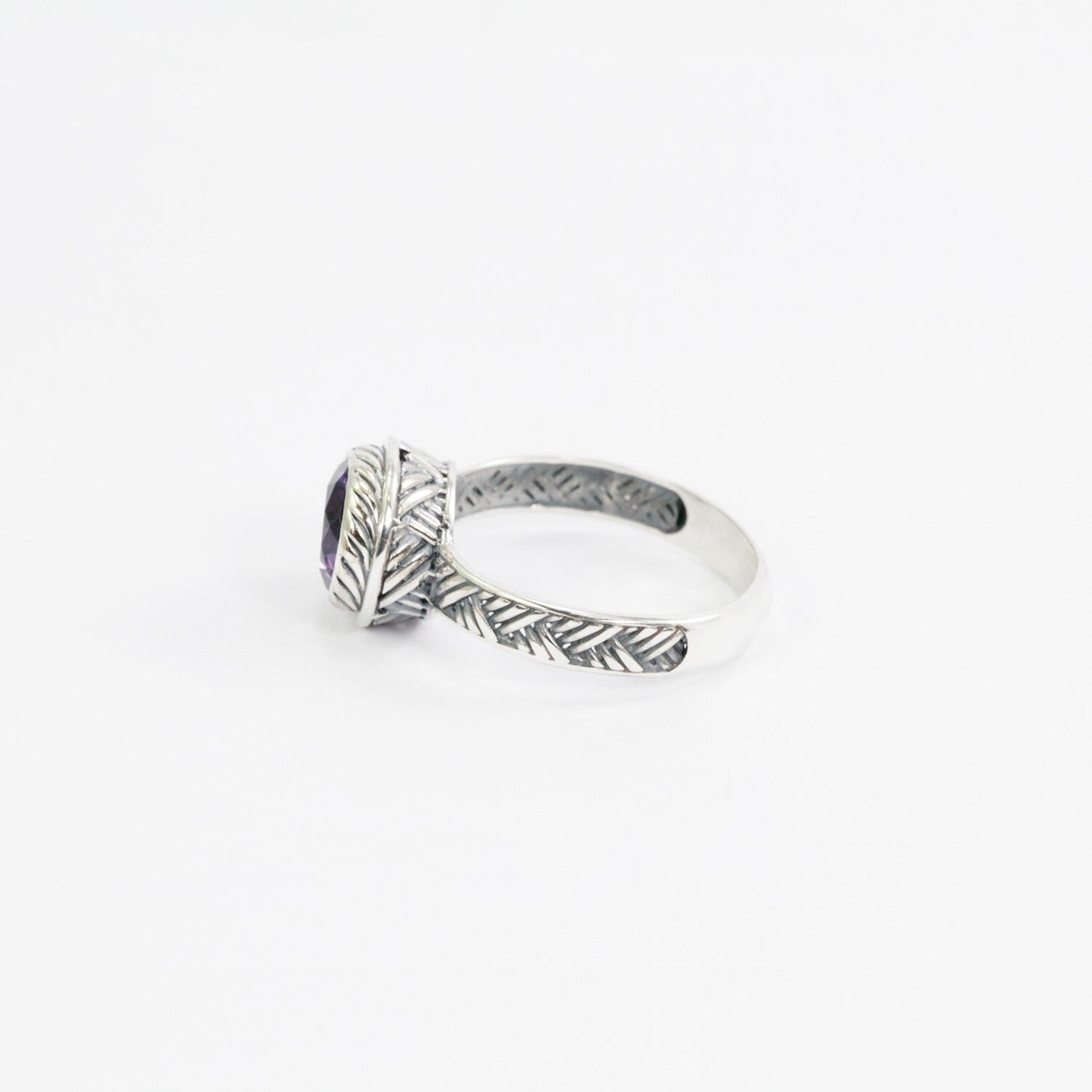 Amethyst solitaire ring handmade bezel set in 925 sterling silver decorated with woven ornament