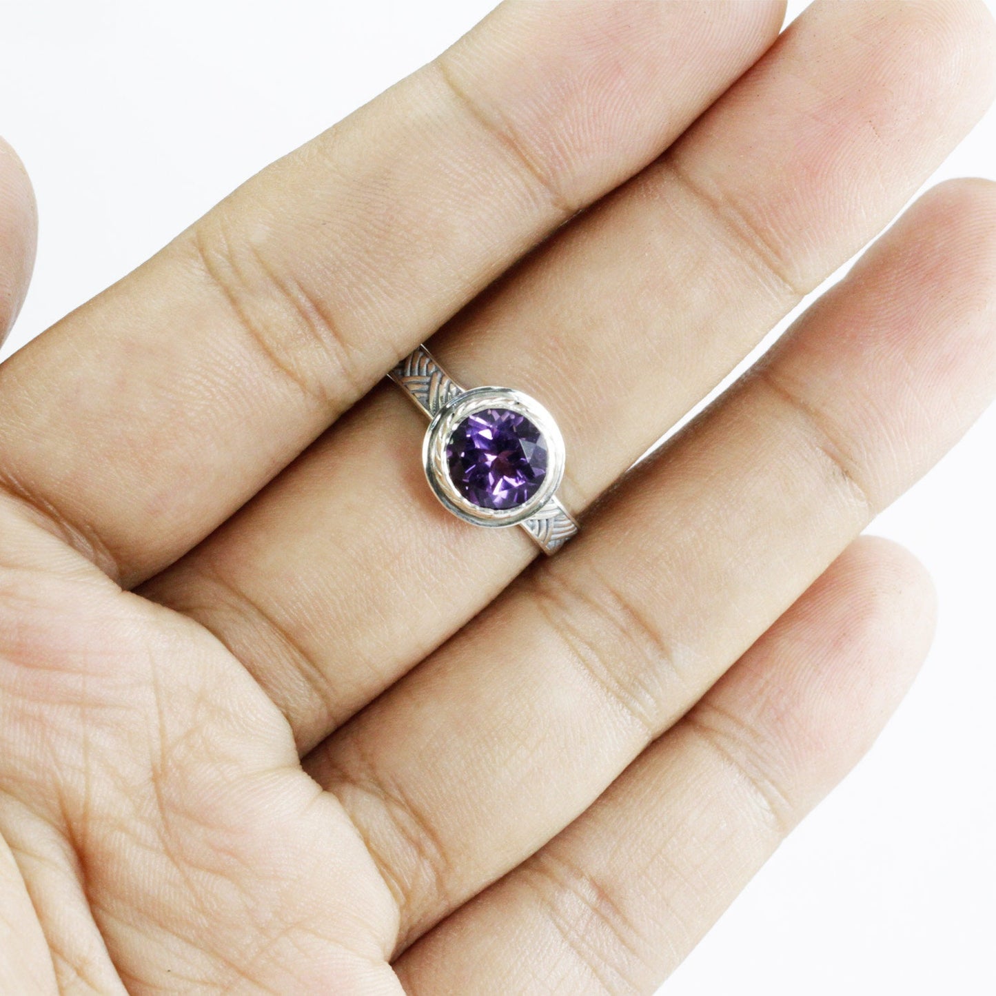 Amethyst solitaire ring handmade bezel set in 925 sterling silver decorated with woven ornament