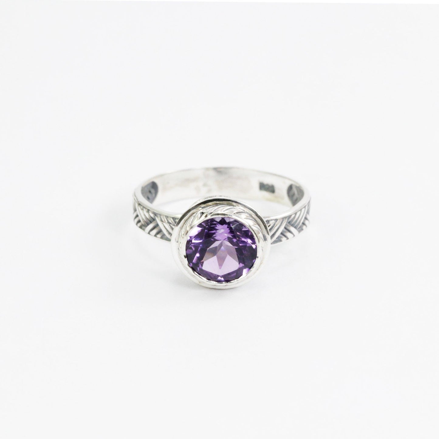 Amethyst solitaire ring handmade bezel set in 925 sterling silver decorated with woven ornament