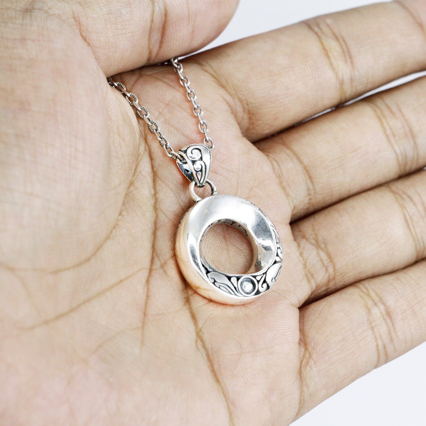 infinity pendant necklace 925 sterling silver spiral shape decorated with Balinese art inspired ornament