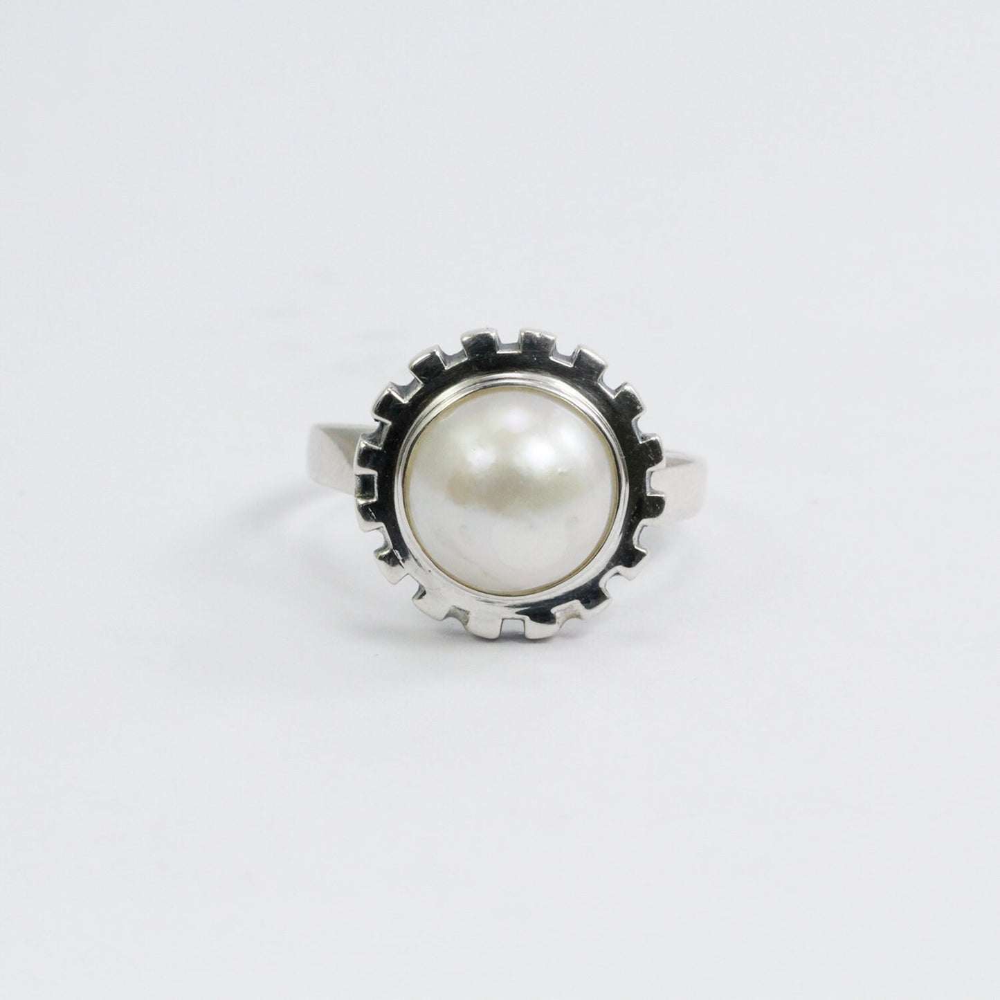 mabe pearl ring set in 925 sterling silver with gear shape bezel