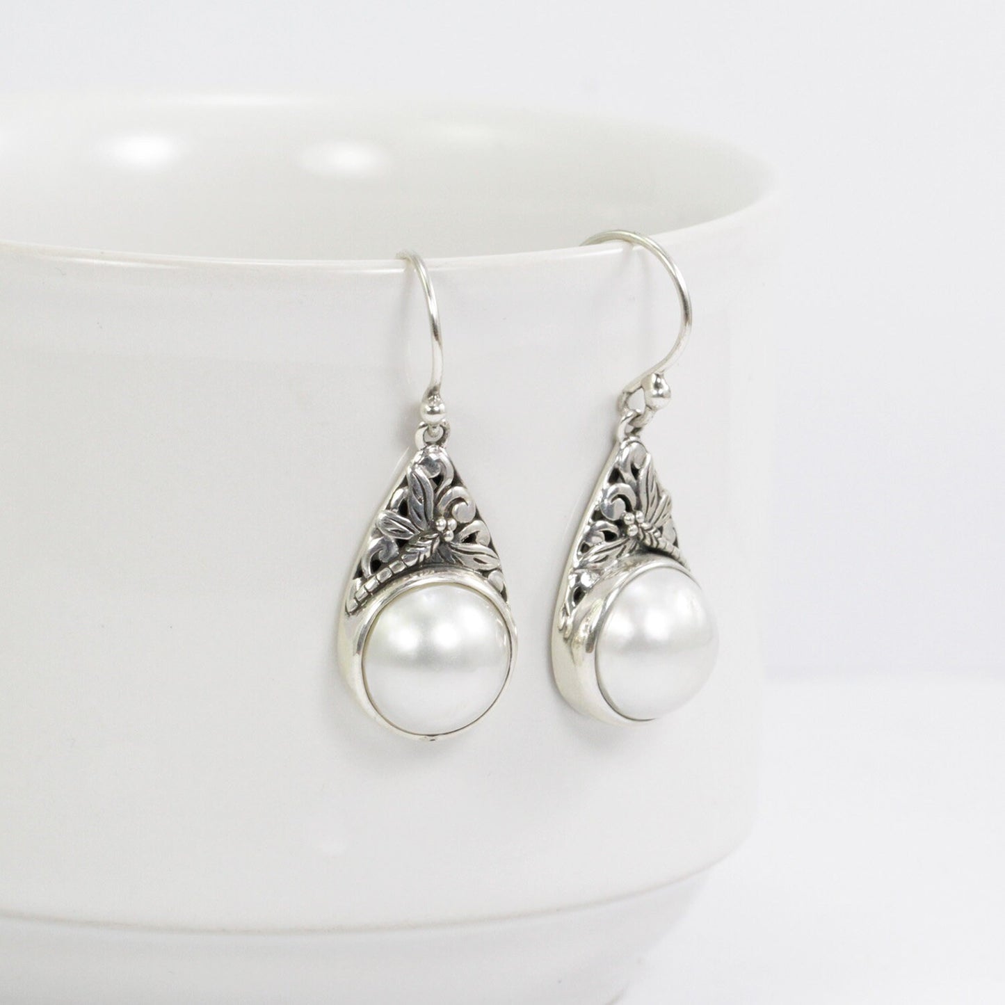 white mabe pearl earrings 925 sterling silver decorated with dragonfly filigree ornament