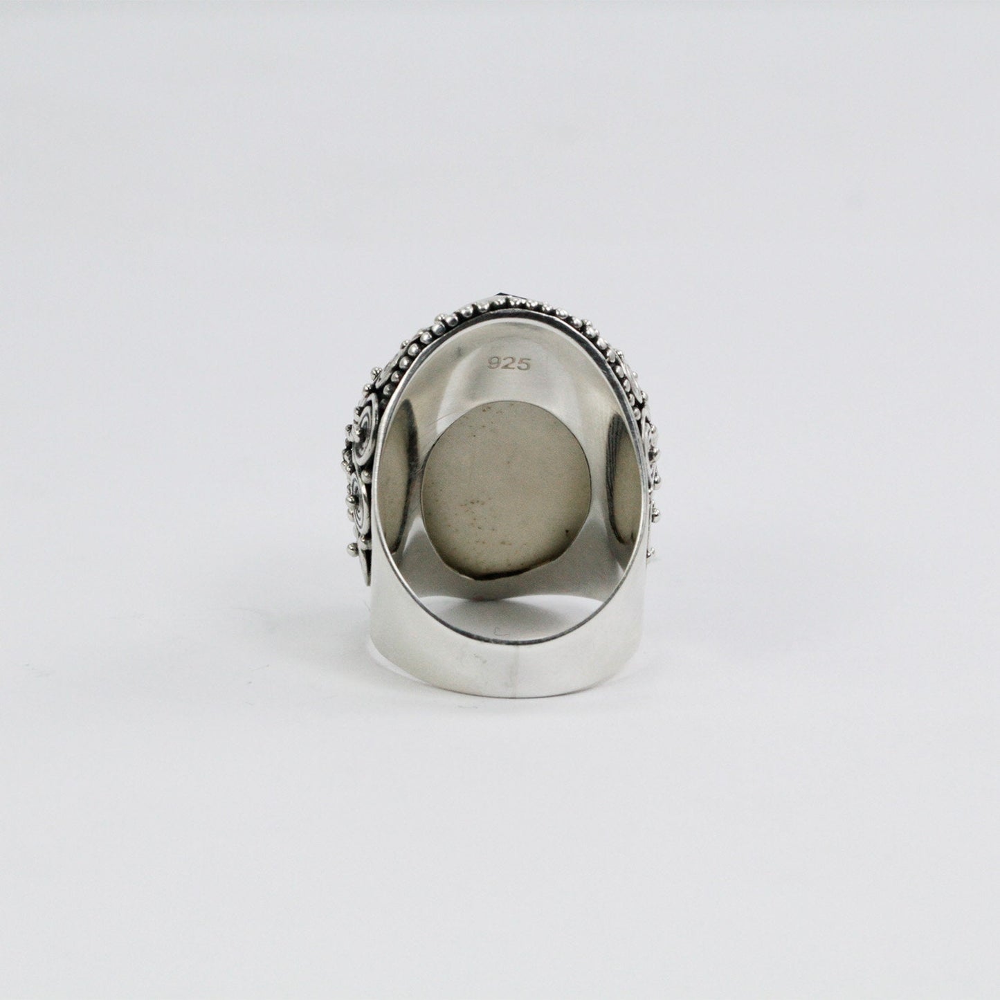 face ring 925 sterling silver with genuine blue topaz and cow bone carving and filigree ornament