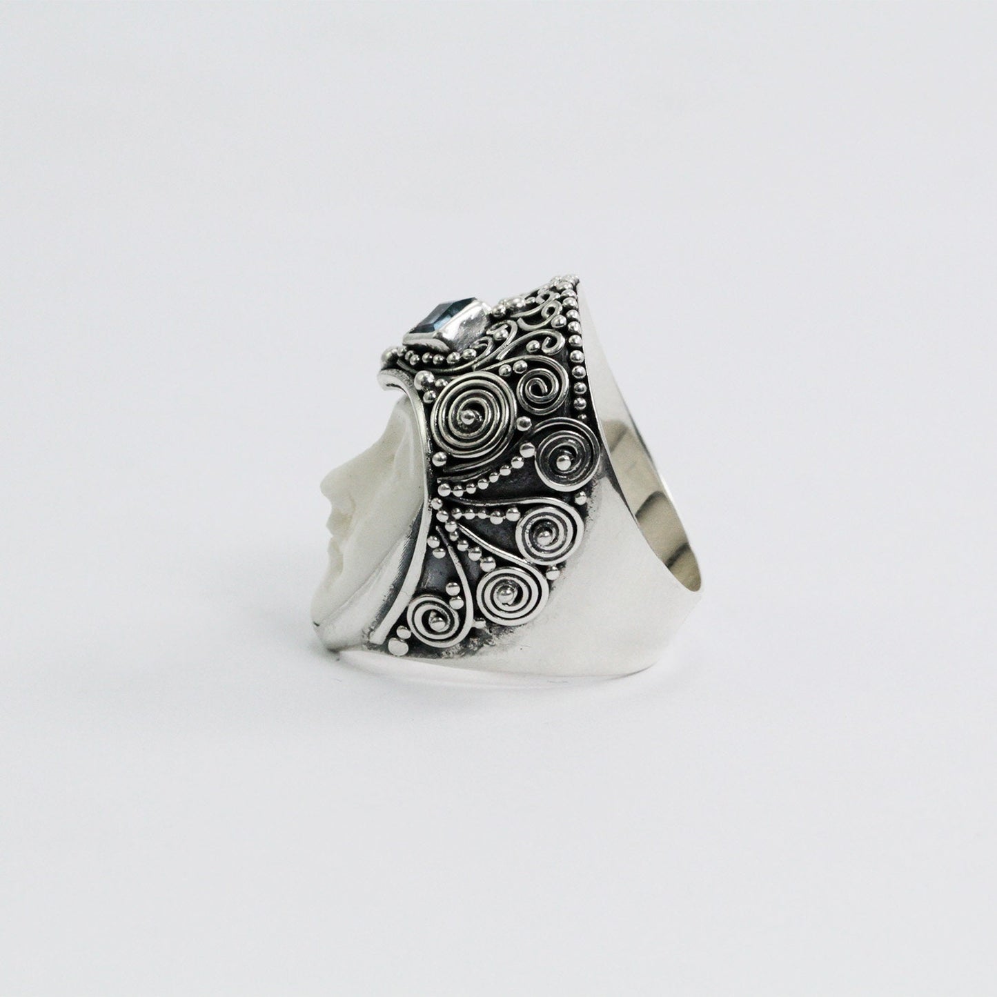 face ring 925 sterling silver with genuine blue topaz and cow bone carving and filigree ornament