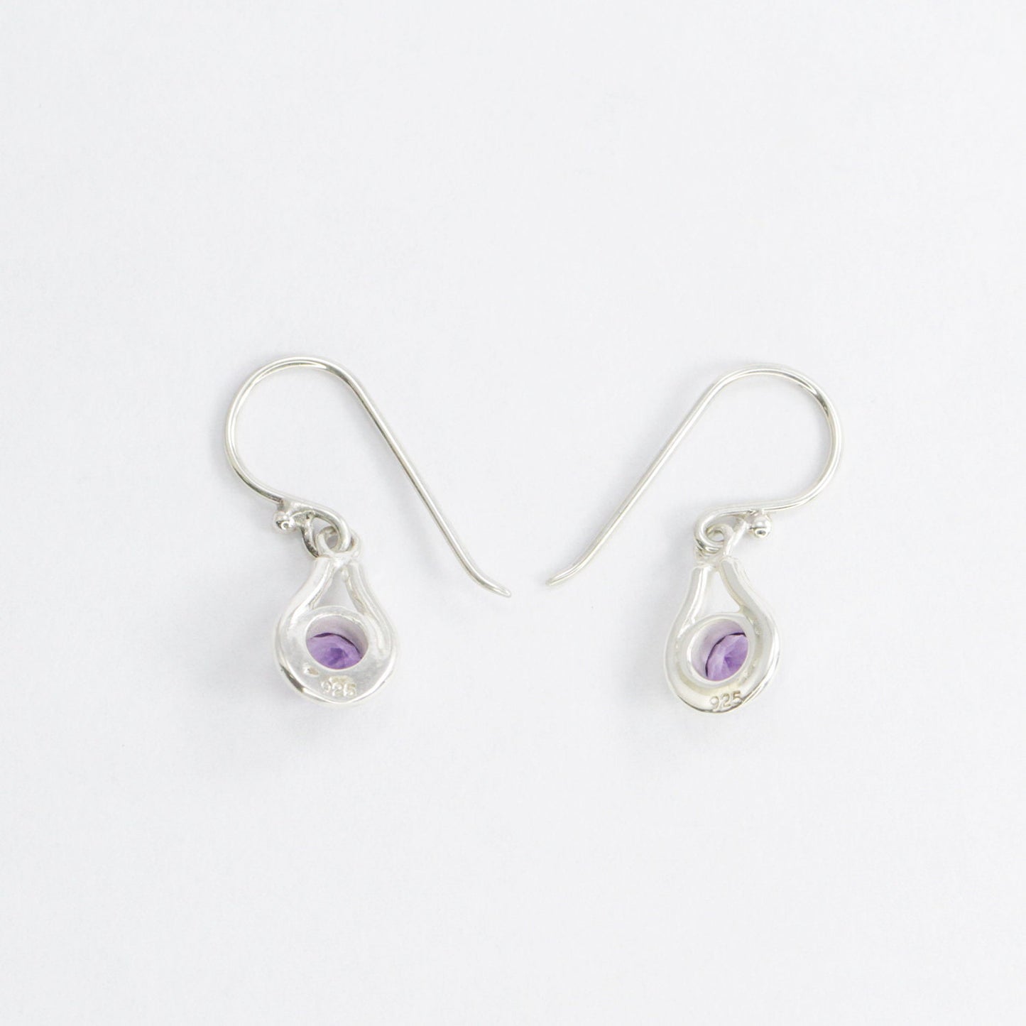amethyst earrings round shape set in 925 sterling silver decorated with white filigree ornament bezel