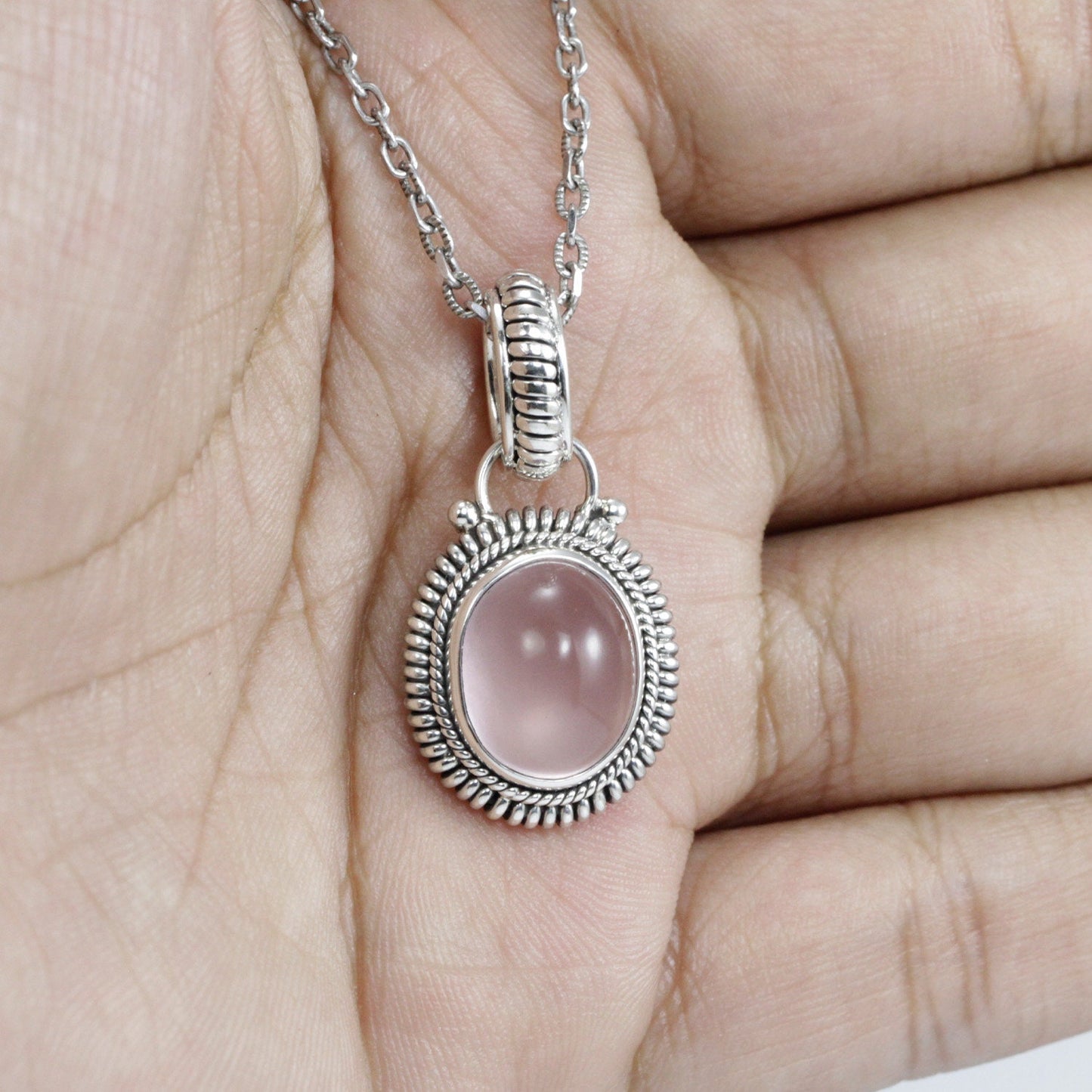 Rose Quartz Pendant set in 925 Sterling Silver Decorated with Rope Cable