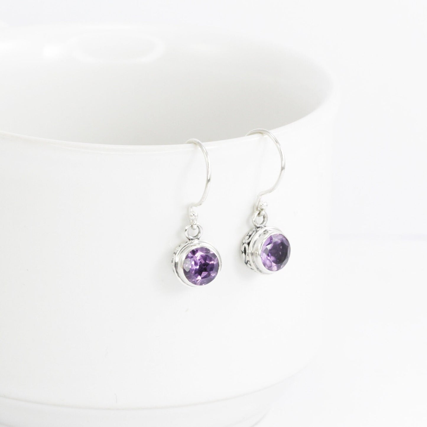 amethyst earrings round shape set in 925 sterling silver decorated with white filigree ornament bezel and back side