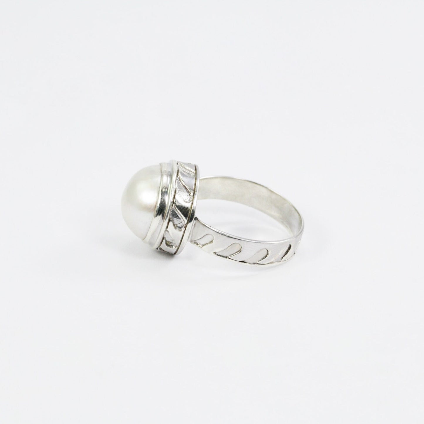 white mabe pearl ring 12 MM set in 925 sterling silver decorated with wave ornament