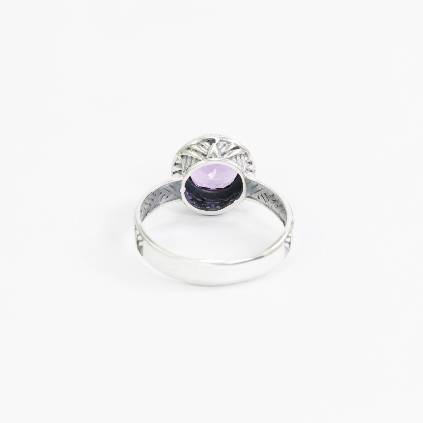 Amethyst solitaire ring handmade bezel set in 925 sterling silver decorated with woven ornament