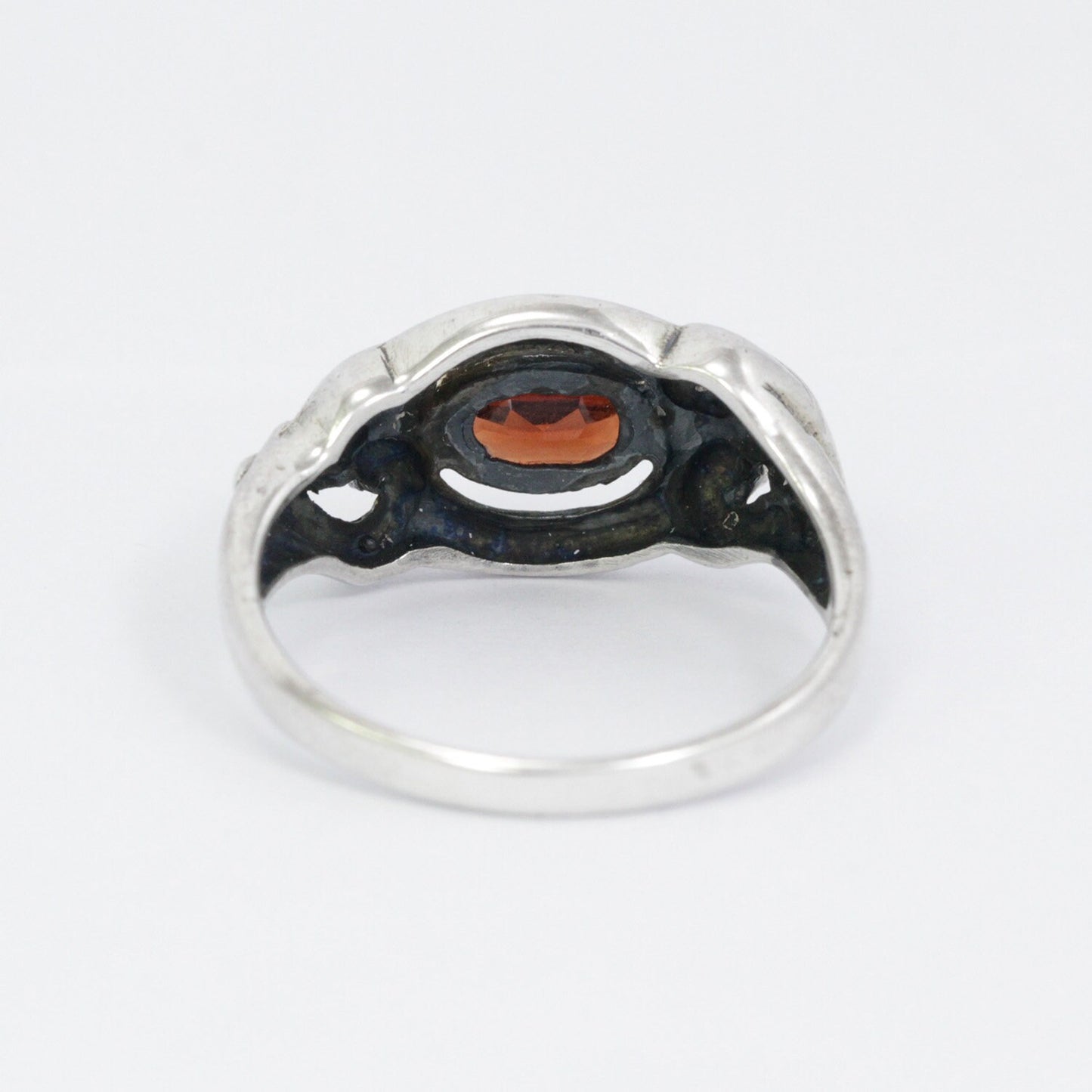 red garnet ring 925 sterling silver decorated with gold bezel and swirl filigree ornament