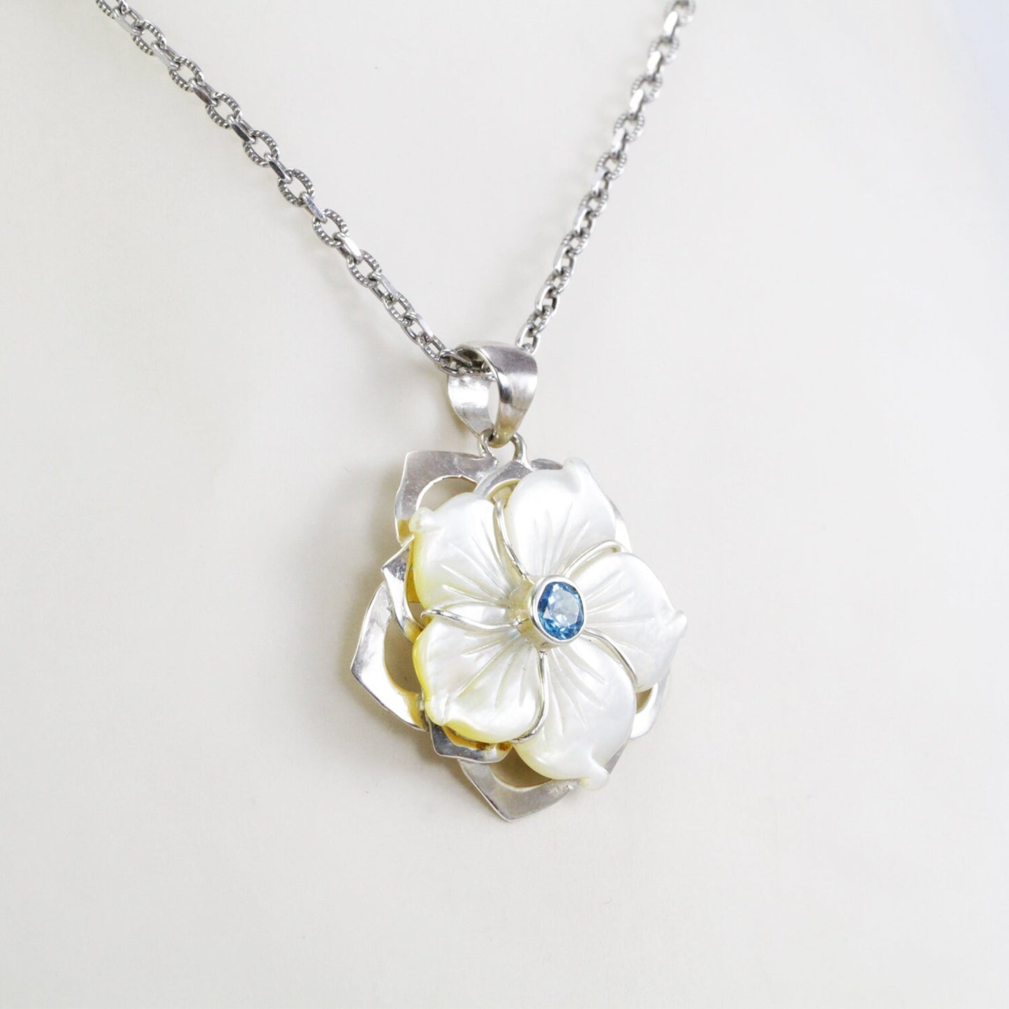 flower necklace pendant dangle set in 925 sterling silver with genuine blue topaz and natural white shell