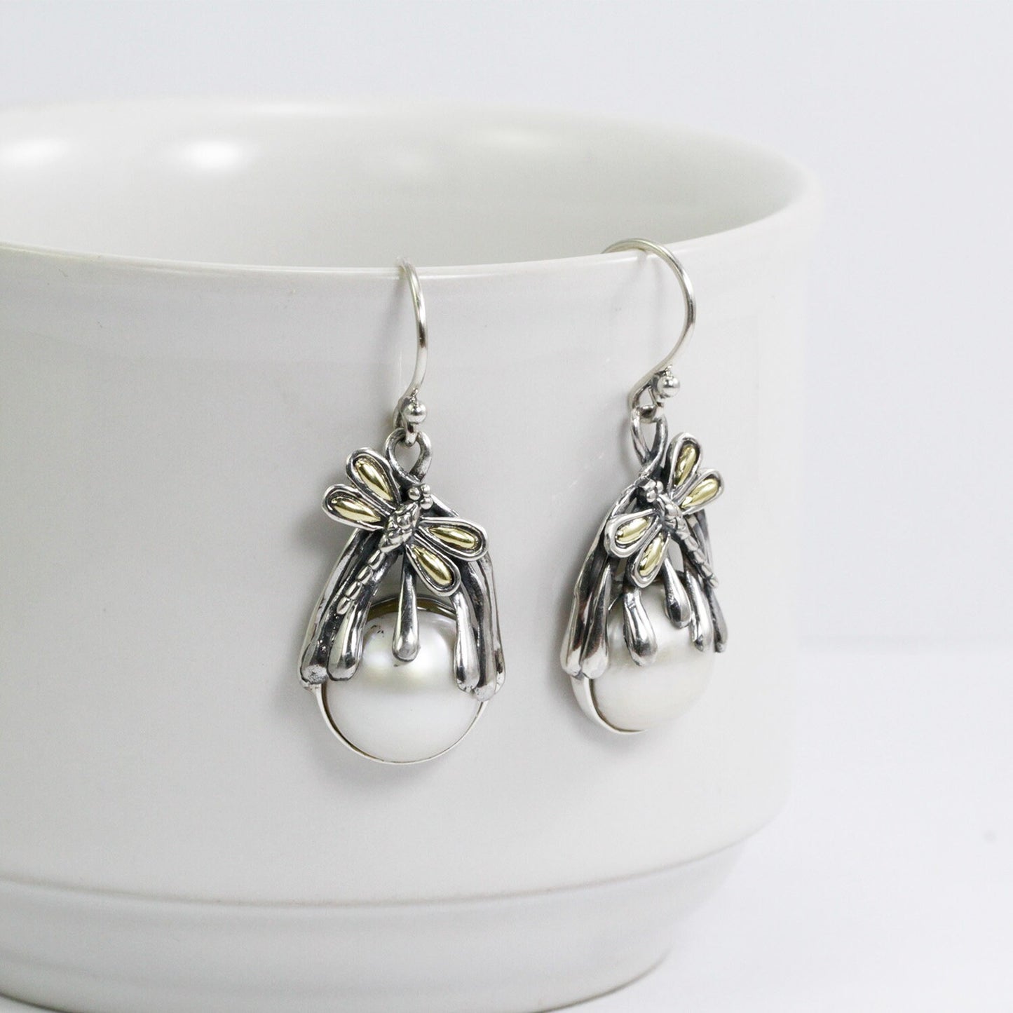white mabe pearl earrings 925 sterling silver decorated with dragonfly on root filigree ornament