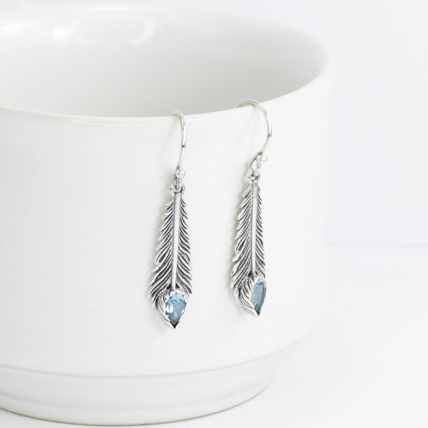 feather earrings 925 sterling silver with genuine blue topaz 4*6 mm bezel set