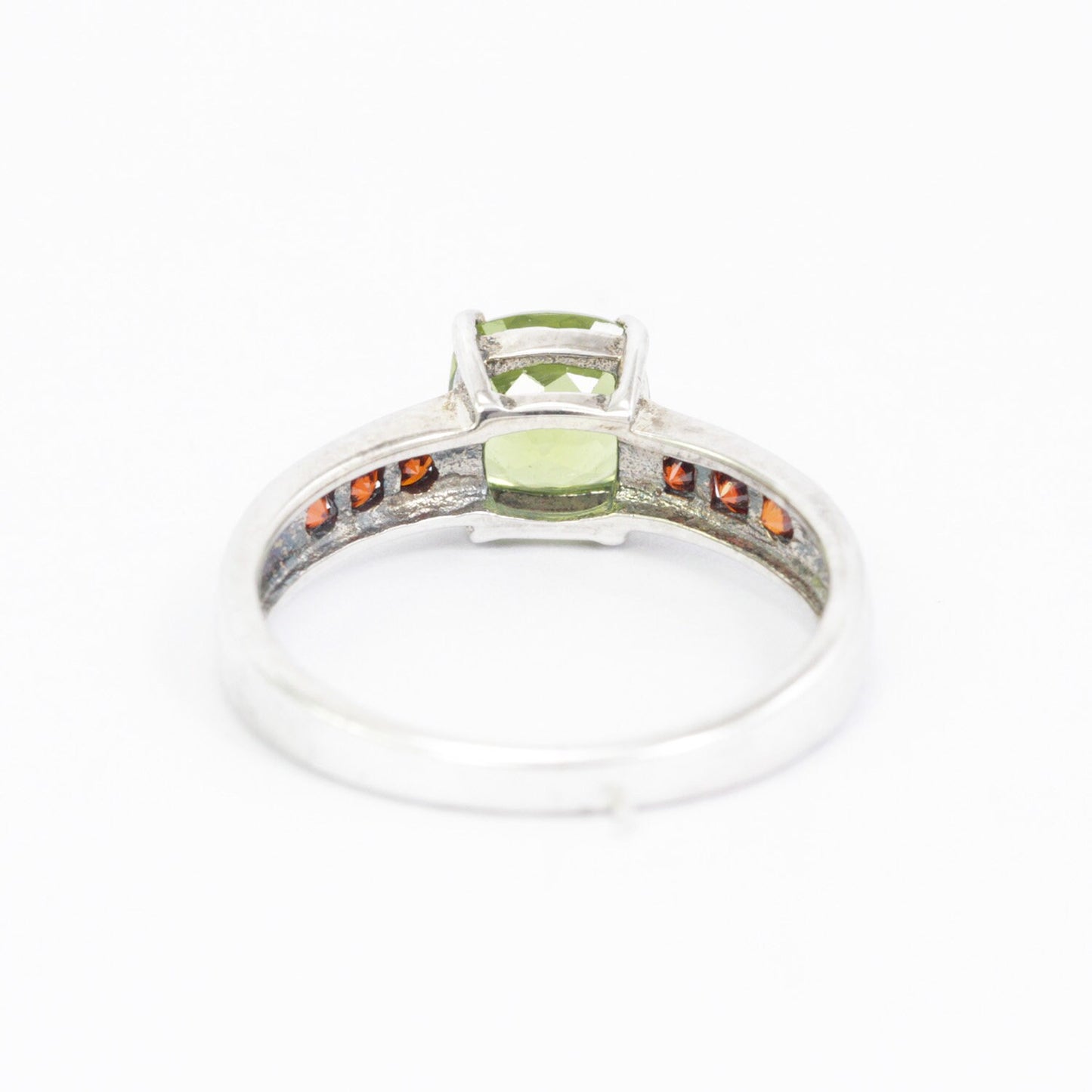 peridot ring sterling silver decorated with red garnet solitaire style