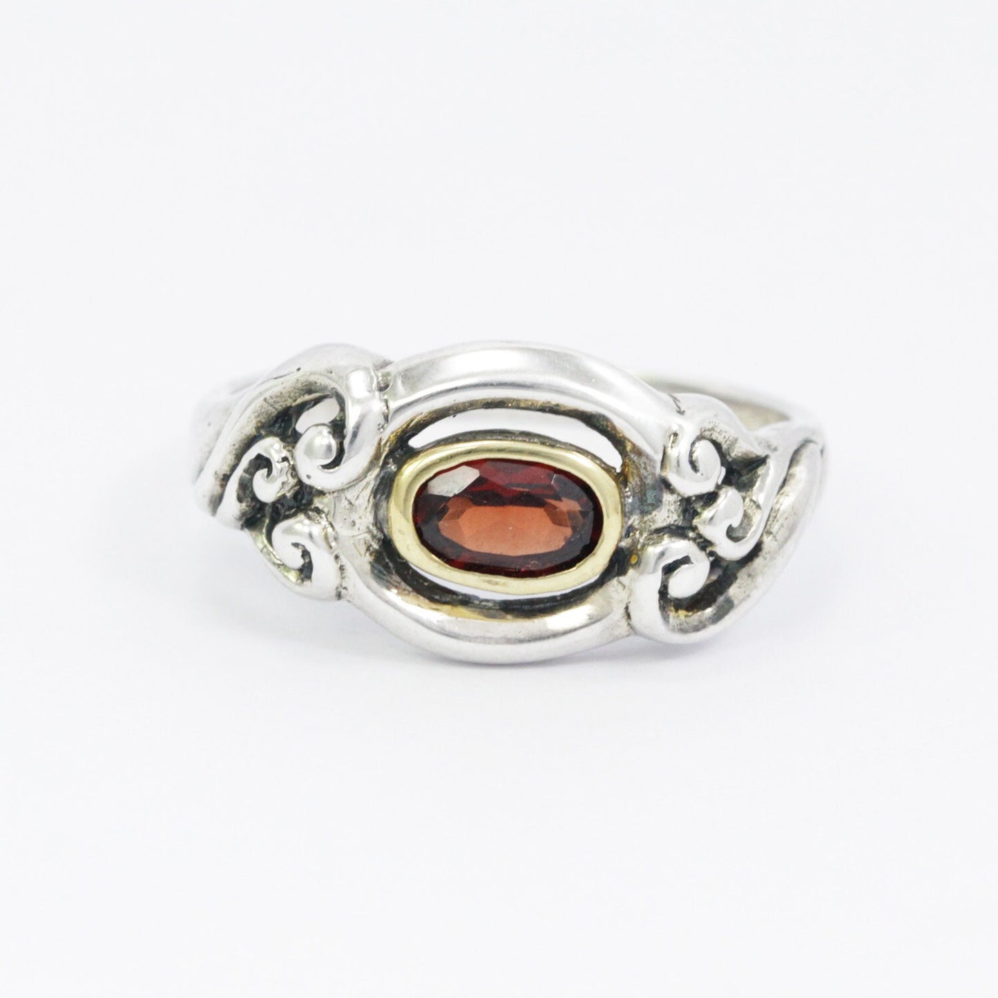 red garnet ring 925 sterling silver decorated with gold bezel and swirl filigree ornament