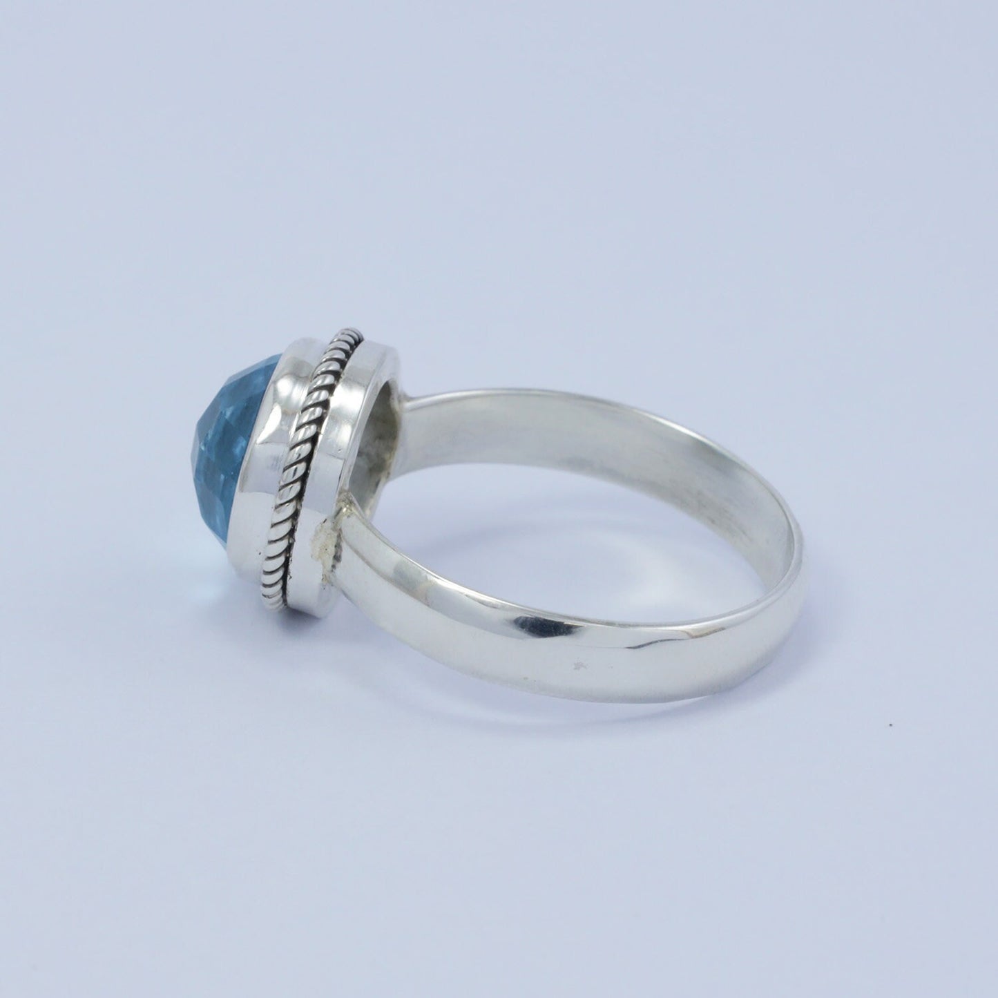 blue topaz ring 925 sterling silver with bezel set with cable rope edge