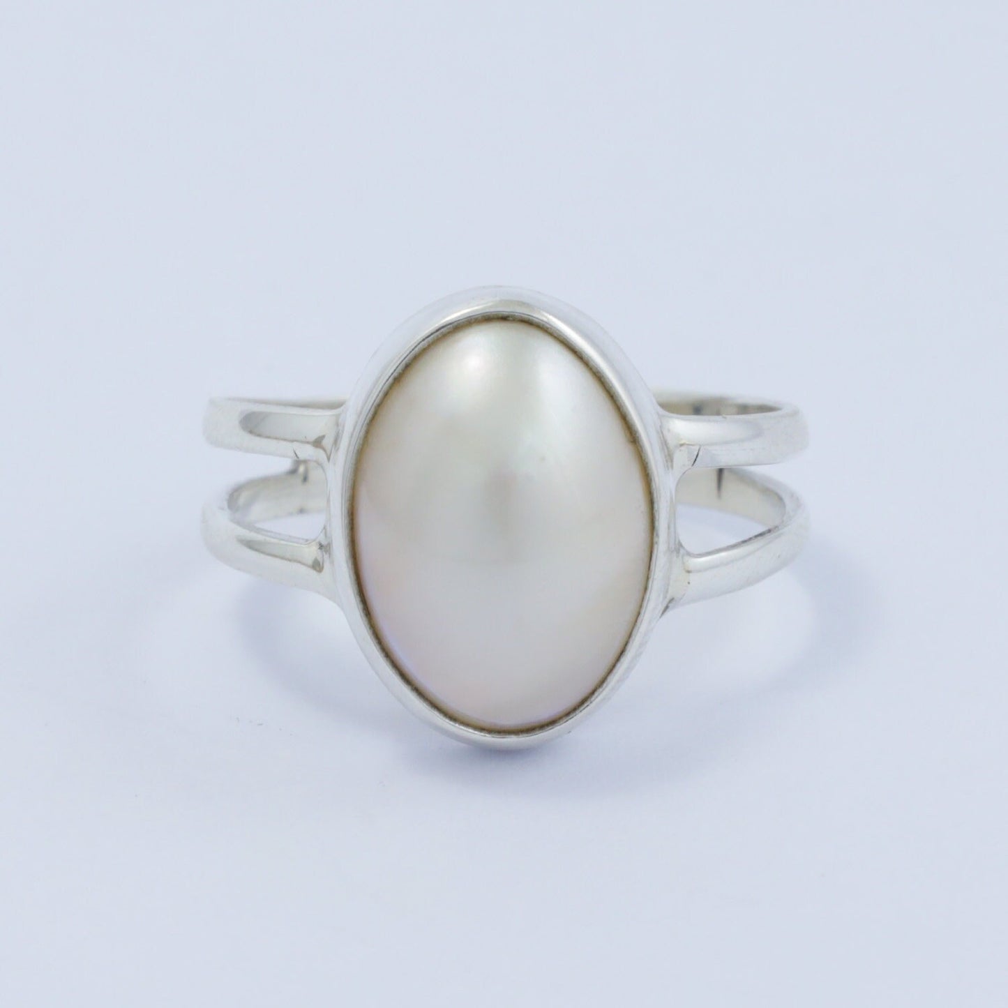 oval mabe pearl ring 925 sterling silver bezel set with split shank ring