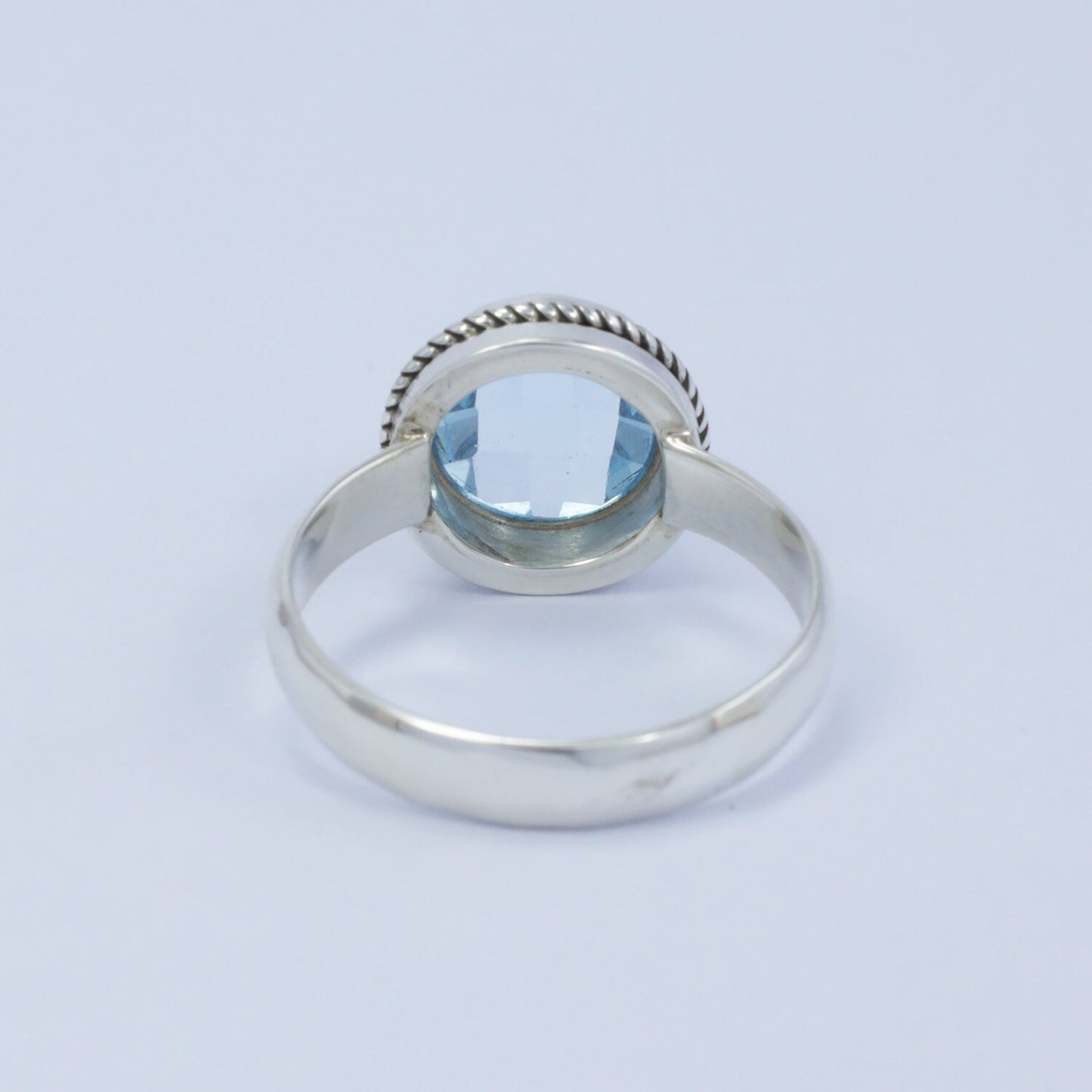 blue topaz ring 925 sterling silver with bezel set with cable rope edge