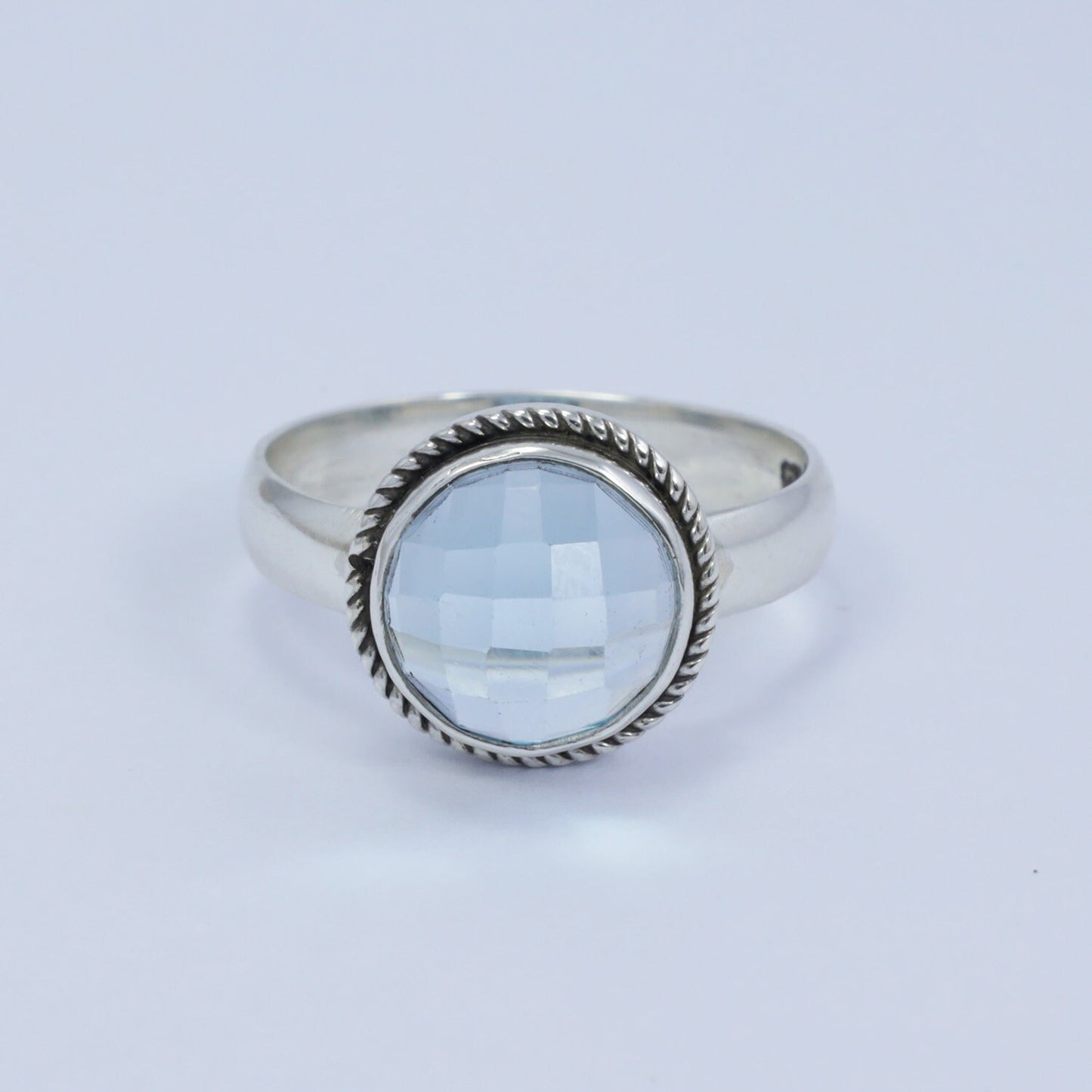 blue topaz ring 925 sterling silver with bezel set with cable rope edge