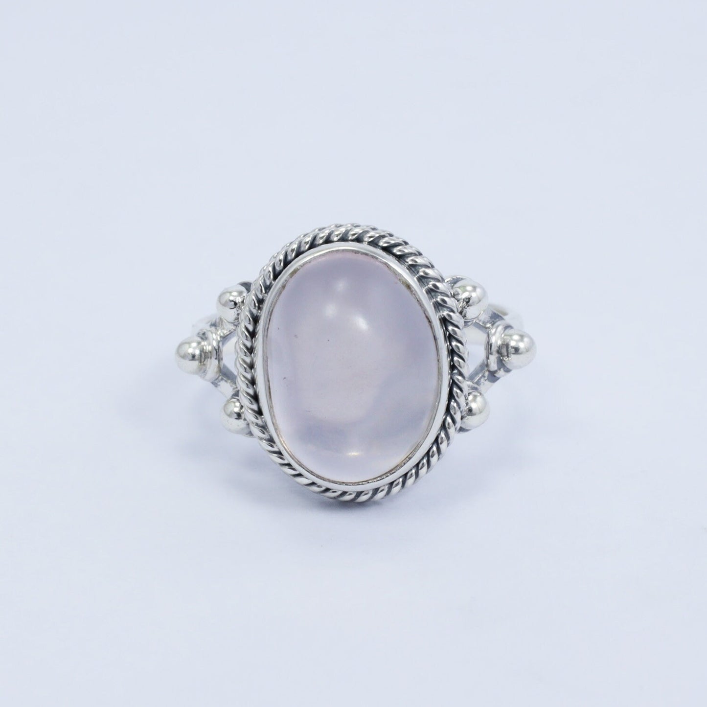 oval rose quartz ring 925 sterling silver with cable style ornament
