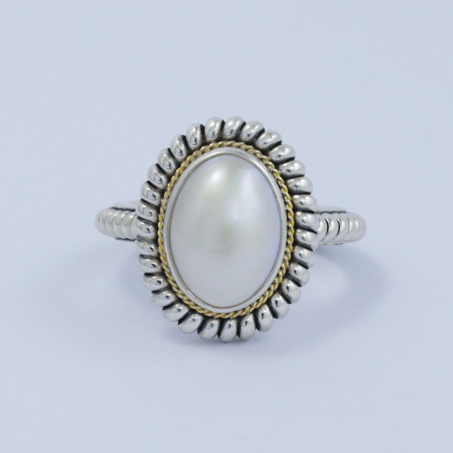 Oval pearl ring 925 sterling silver decorated with cable rope edge and 18k Yellow gold