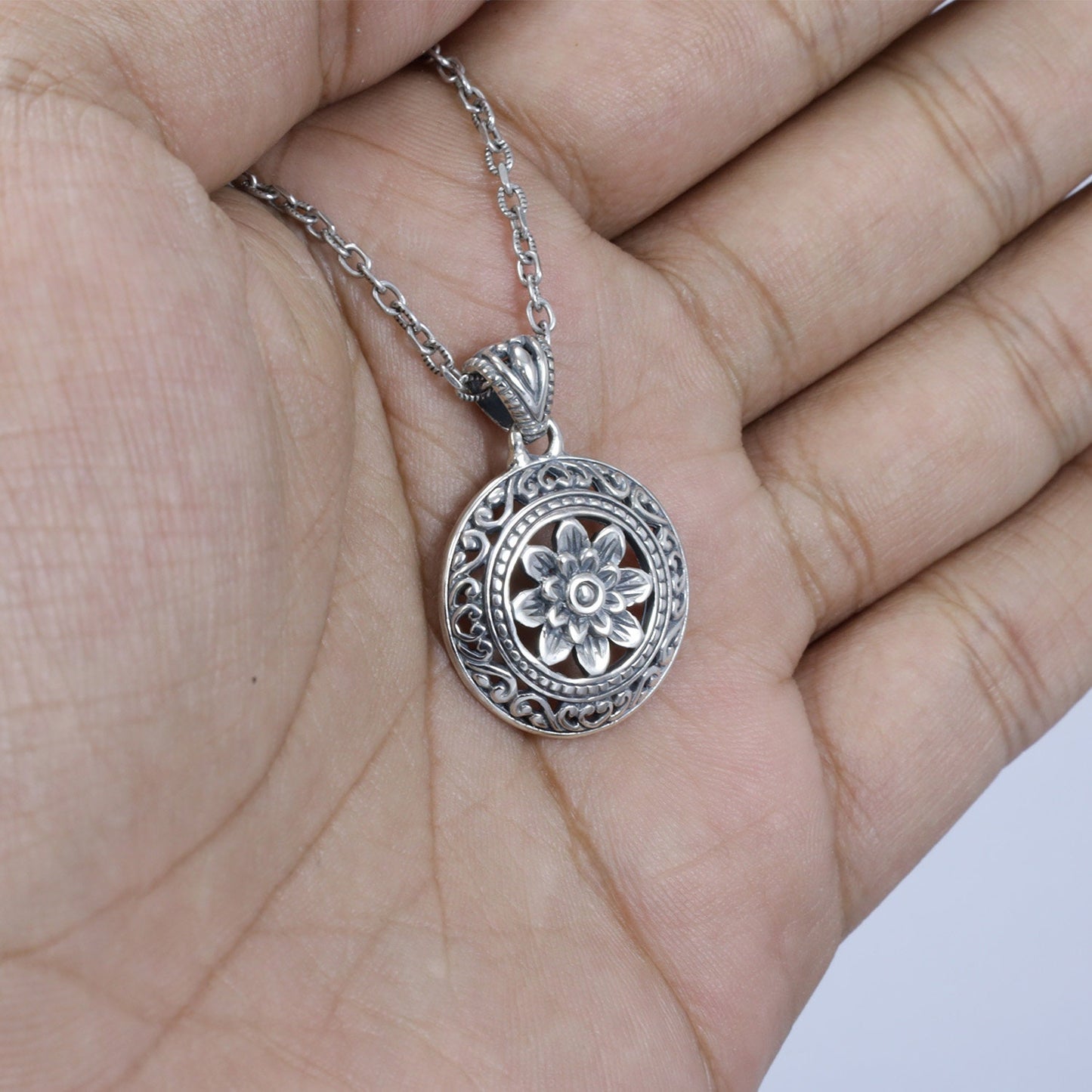 silver lotus flower pendant 925 sterling decorated with swirl filigree ornament and antique finishing