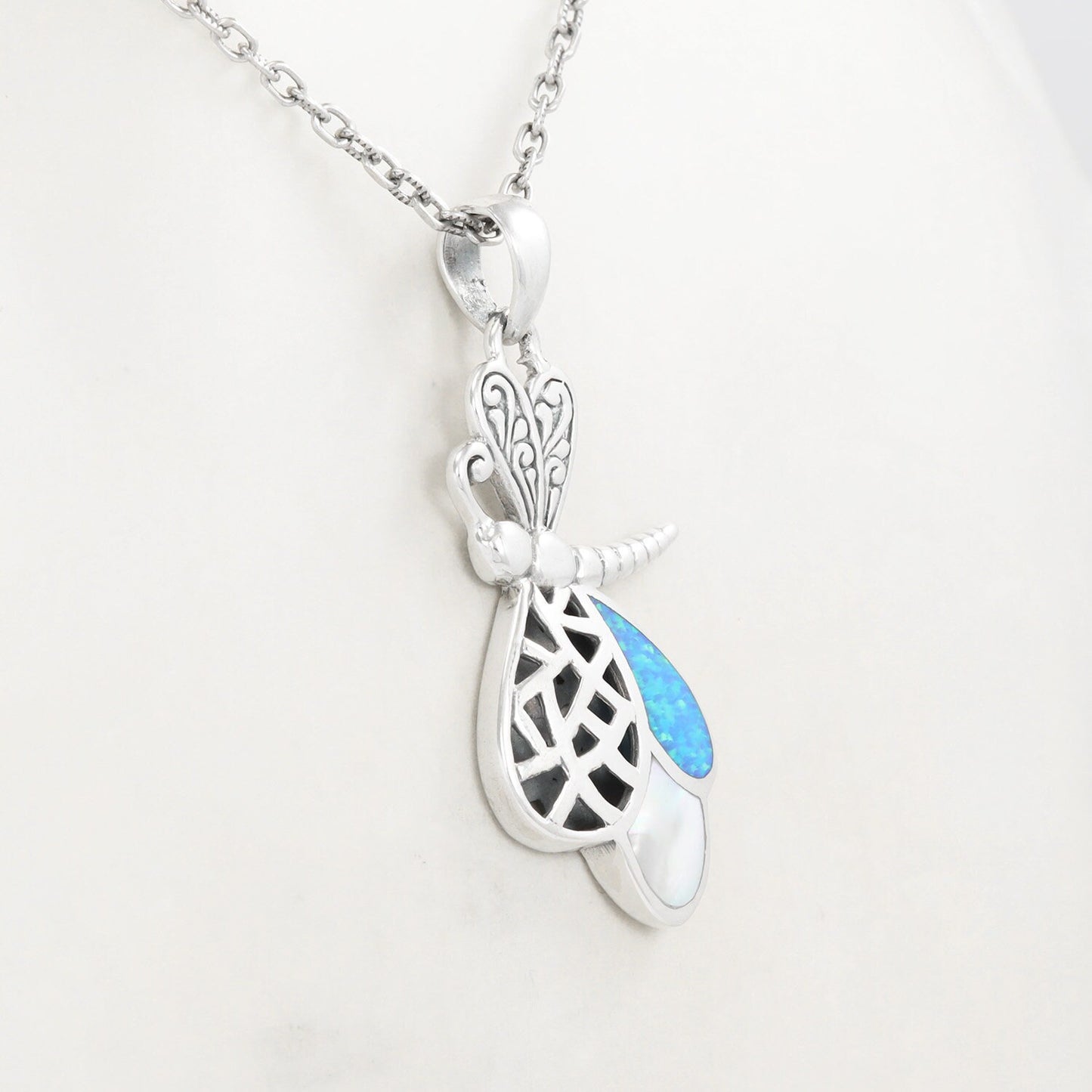 925 sterling silver dragonfly pendant with filigree ornament, created blue opal and genuine white shell