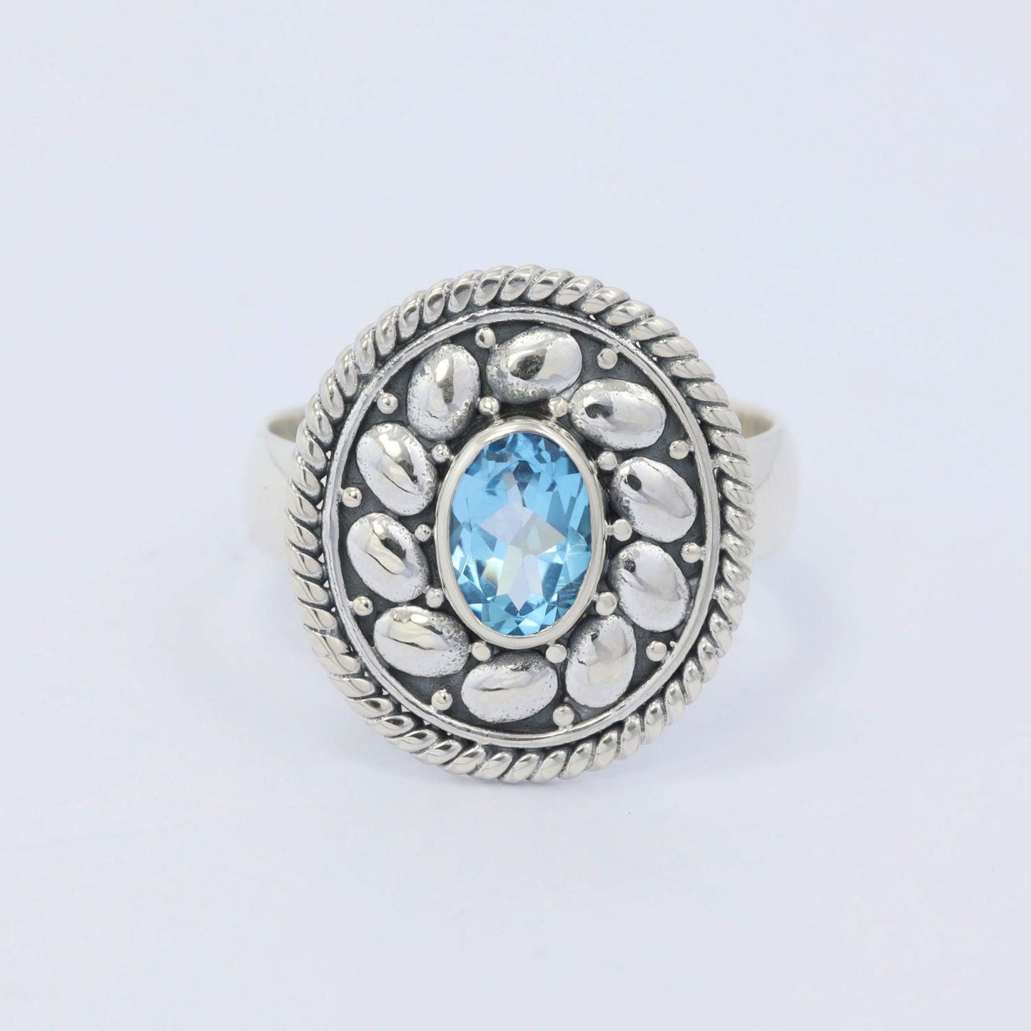 Swiss blue topaz ring 925 sterling silver decorated with Bali legacy ornament