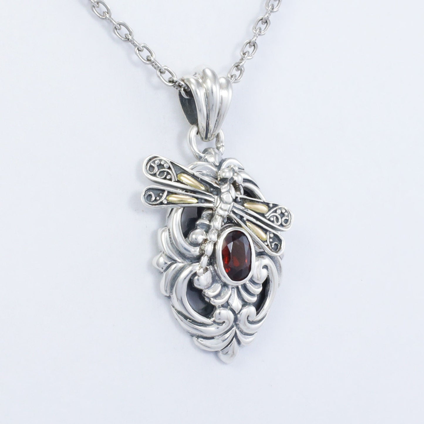 925 sterling silver pendant with genuine red garnet decorated with 18K yellow gold dragonfly and ornament art