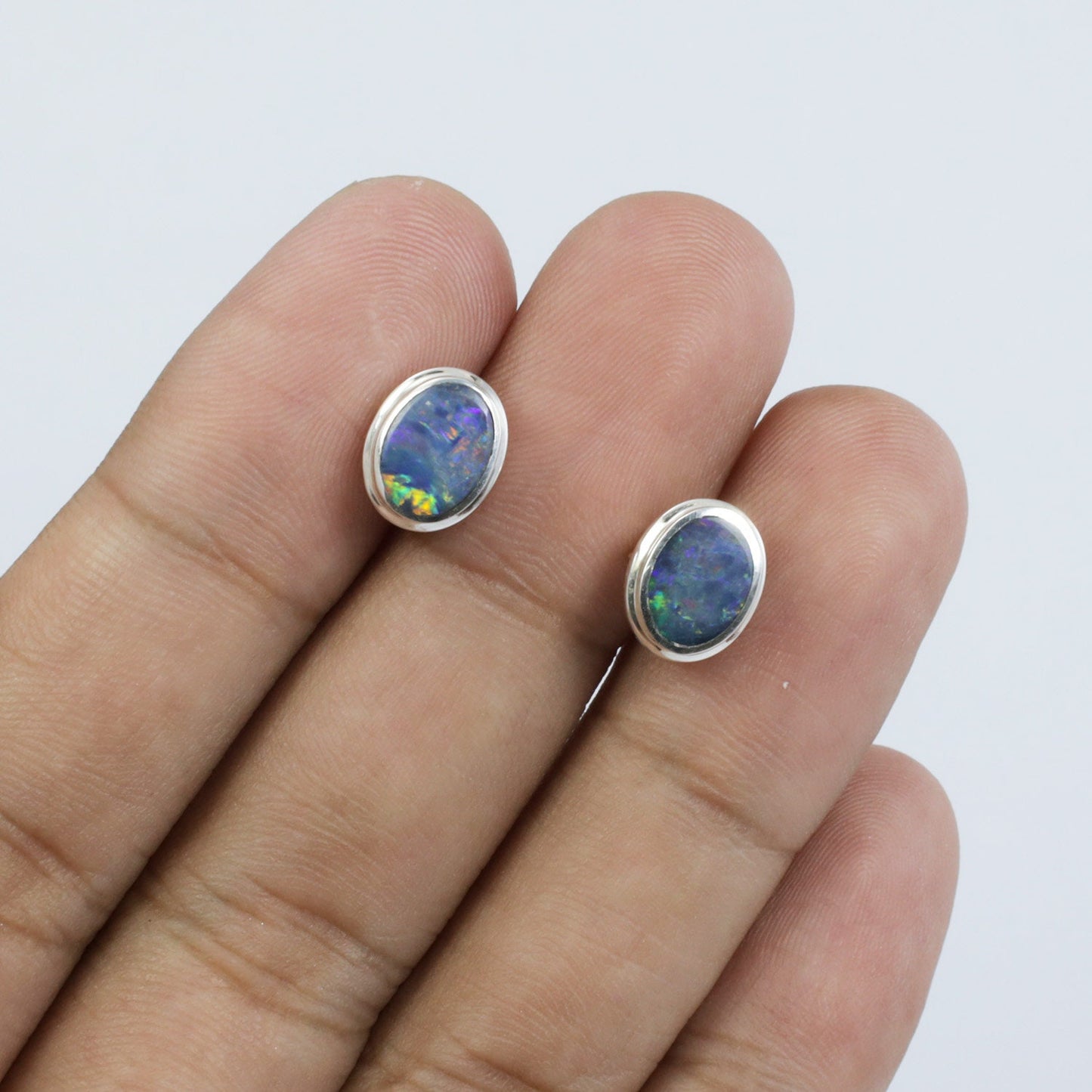 fire opal stud earrings set in 925 sterling silver 7*5 mm oval shape
