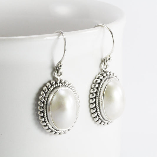 Beautiful dangle drop oval 10*14 mm mabe pearl earrings set in bezel handmade woven cable edge 925 sterling silver, oval pearl earrings