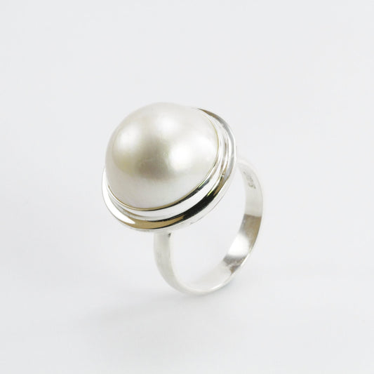 white mabe pearl ring set in 925 sterling silver double bezel