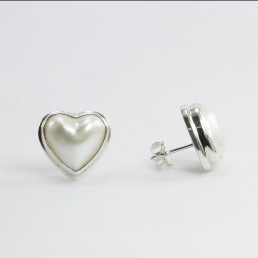 Heart Shape pearl stud earrings set in 925 sterling silver double bezel