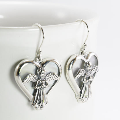 silver angel earrings with natural white shell set in 925 sterling silver