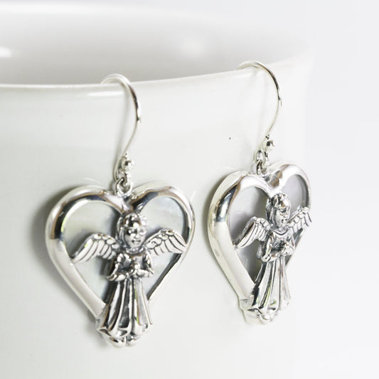 silver angel earrings with natural white shell set in 925 sterling silver