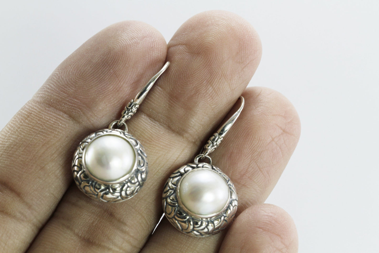 Beautiful white mabe pearl dangle drop earrings set in handmade 925 Sterling silver decorated with Dragon skin carving