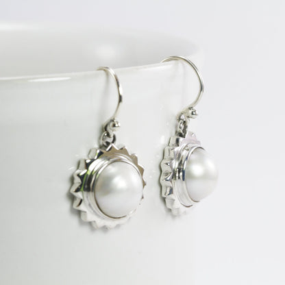 white mabe pearl earrings set in 925 sterling silver