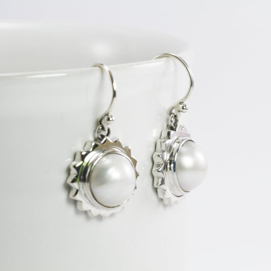 white mabe pearl earrings set in 925 sterling silver