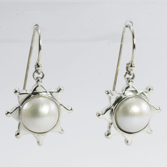 white mabe pearl earrings set in 925 sterling silver with star shape ornament
