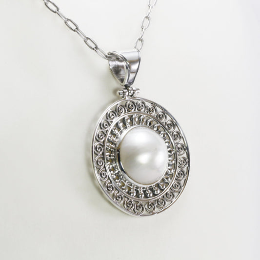 Genuine round 16 mm white Mabe pearl set in handmade 925 sterling silver pendant decorated with Bali jawan filigree