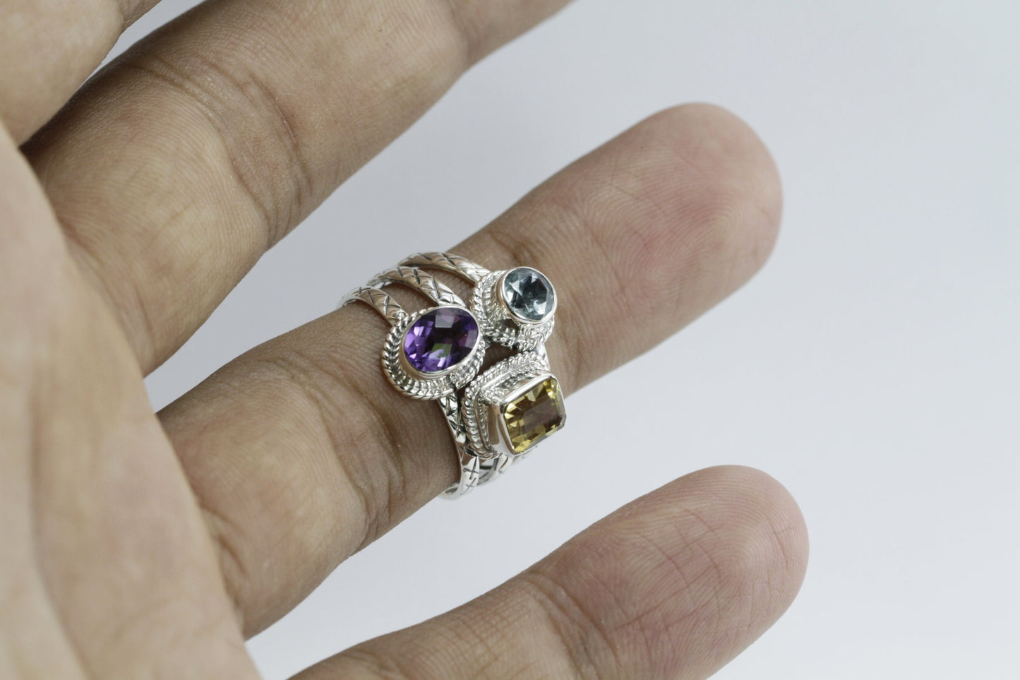 Three stones ring set in 925 sterling silver, combination of natural amethyst, citrine, and blue topaz decorated with cable rope
