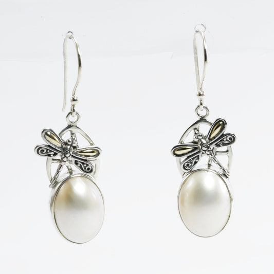 oval pearl earrings set in 925 sterling silver decorated with dragonfly ornament and 18 K gold