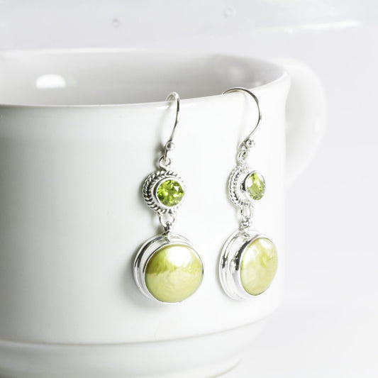 green peridot earrings set in 925 sterling silver with green baroque pearl